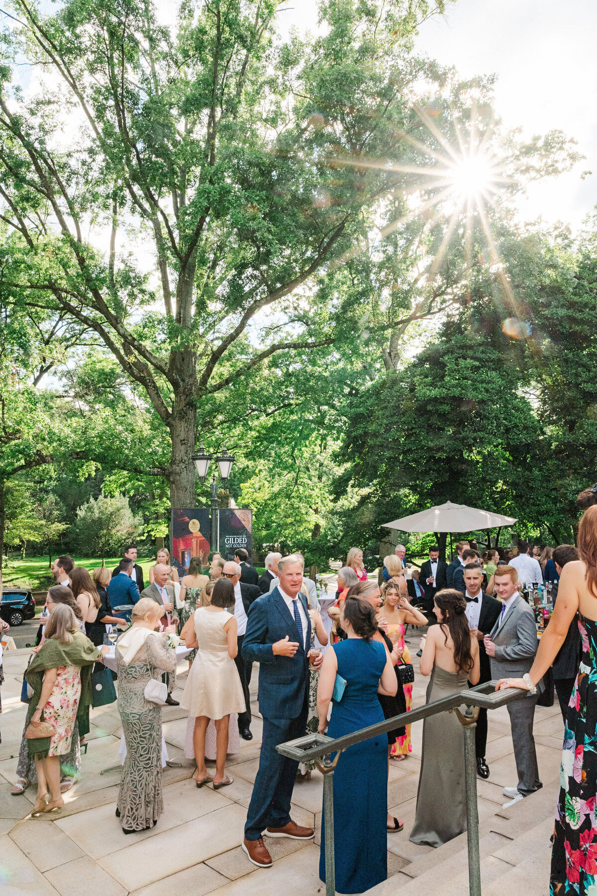 cocktail hour on the front patio of the frick museum