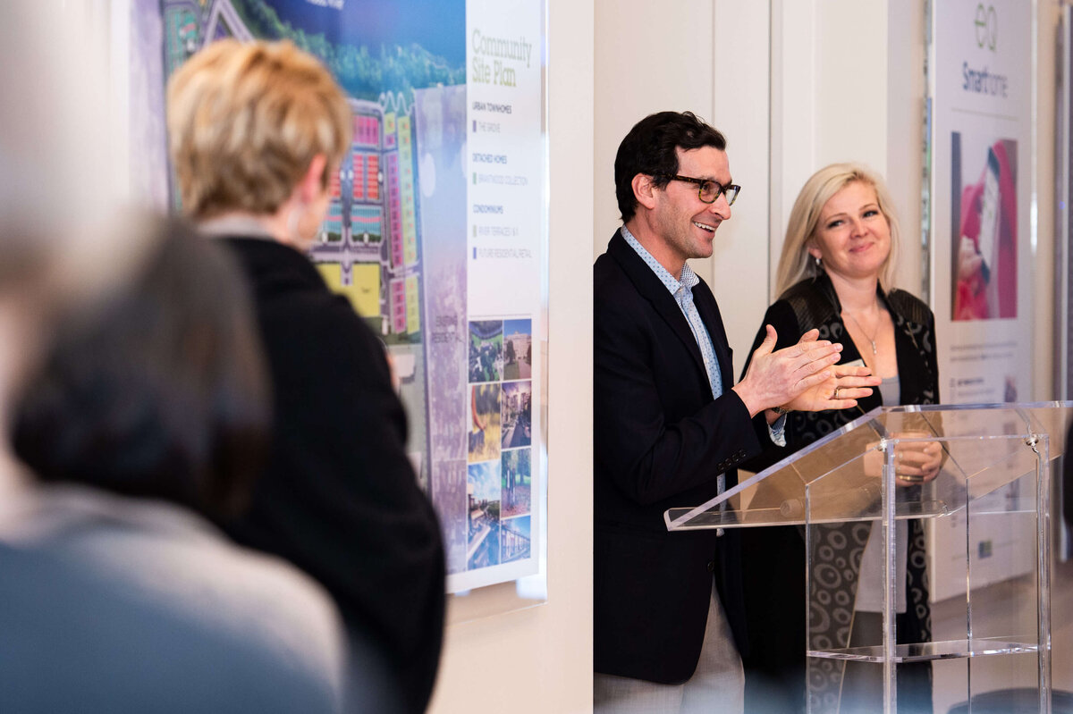 the host of eQ addressing and welcoming guests to the eQ Groundbreaking event.  Captured by Ottawa Event Photographer JEMMAN Photography COMMERCIAL