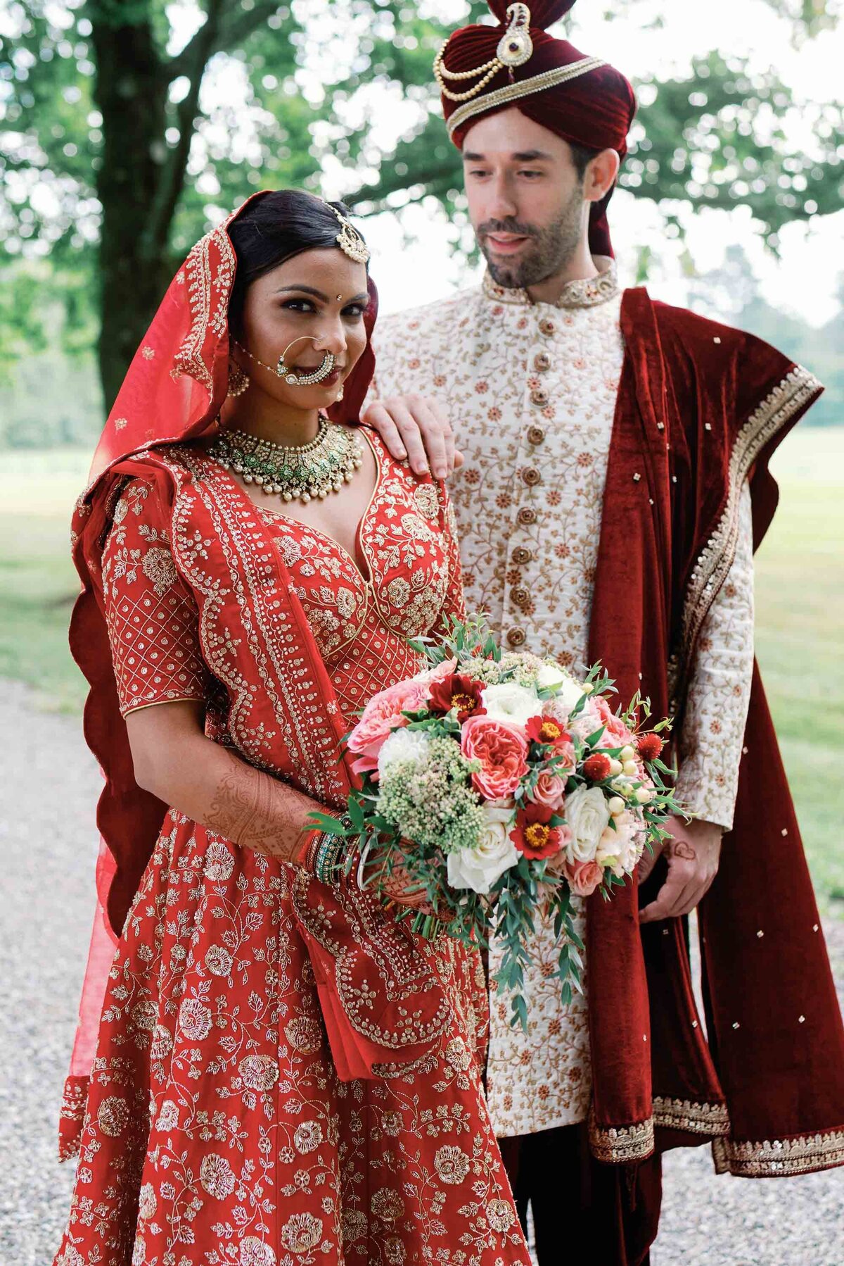 Traditional indian wedding with bride in red at the shelburne museum brick house
