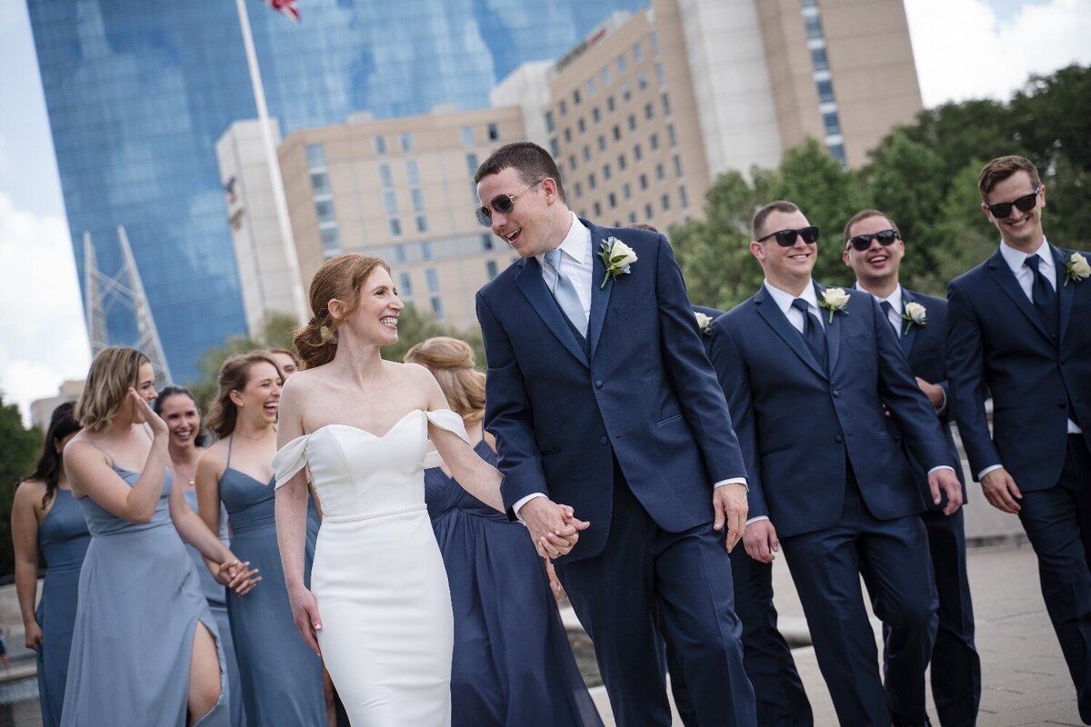 Bride-and-groom-smiling-holding-hands-jewish-wedding-jps-events-indianapolis.jpg