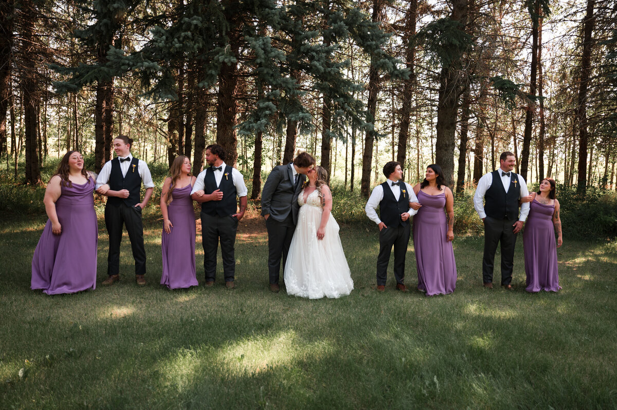 Edmonton wedding portrait of a wedding party all talking, candid natural photography