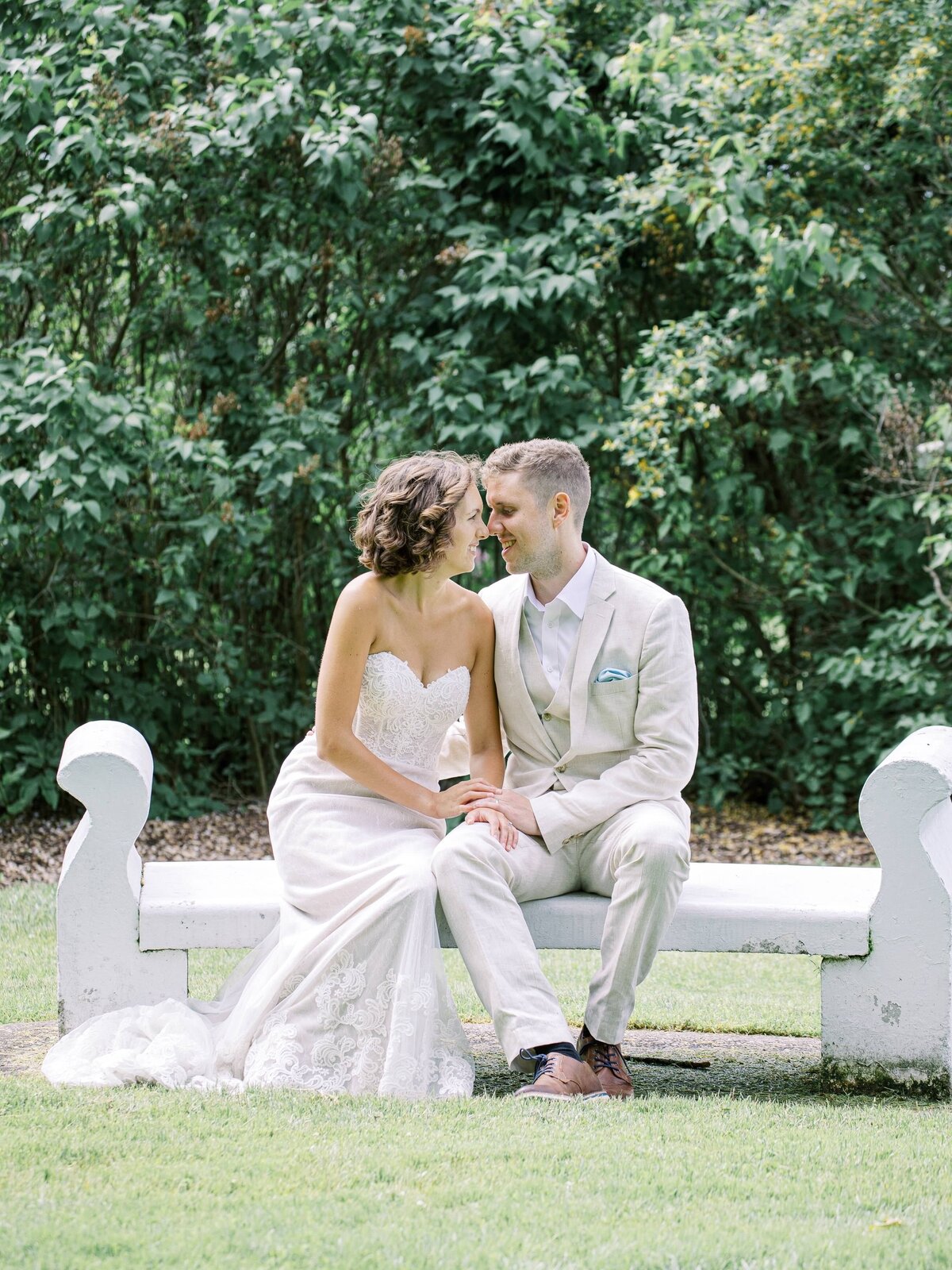 Bride and Groom portrait on a bench