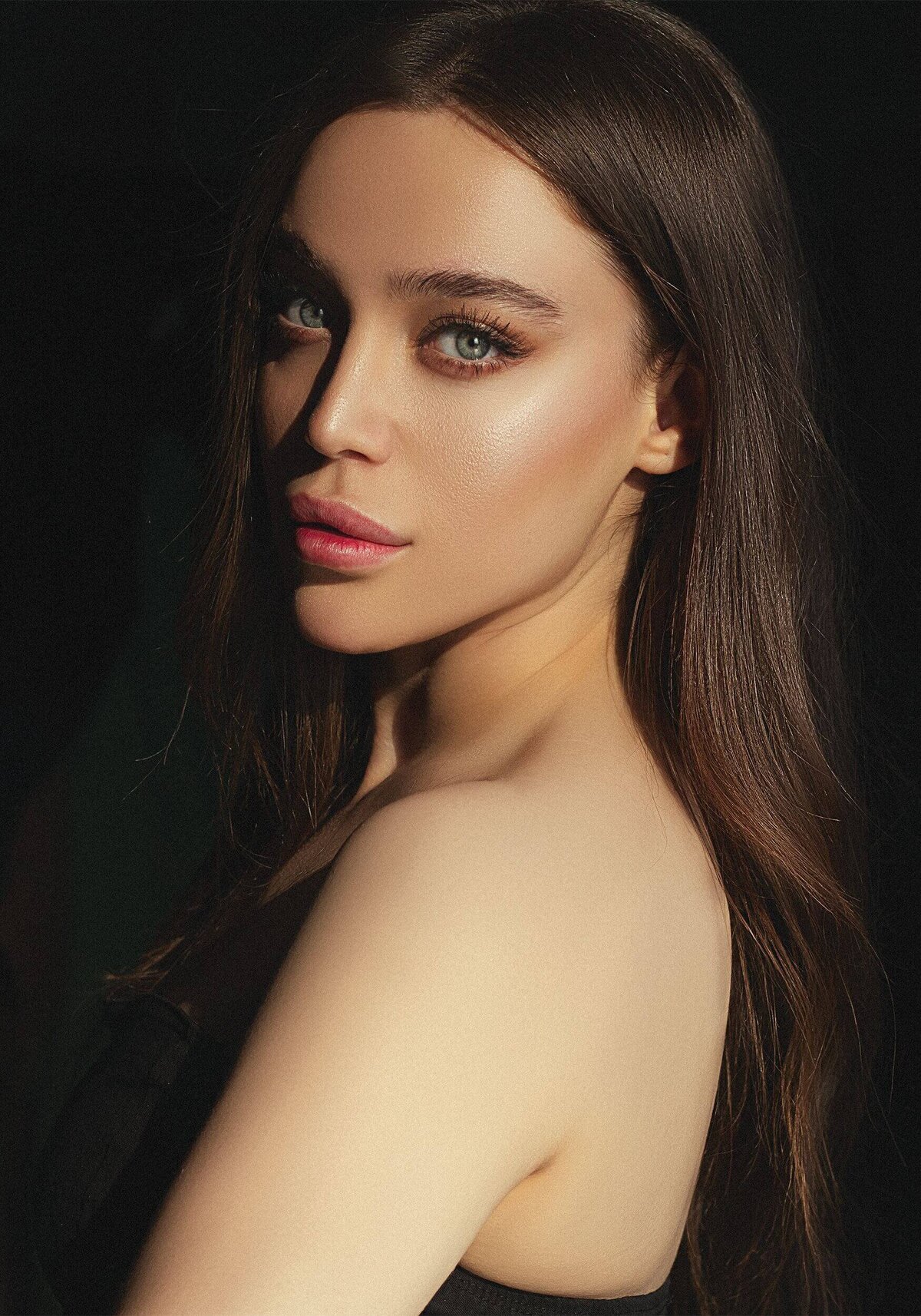 A Beautiful Woman Looking Over Shoulder