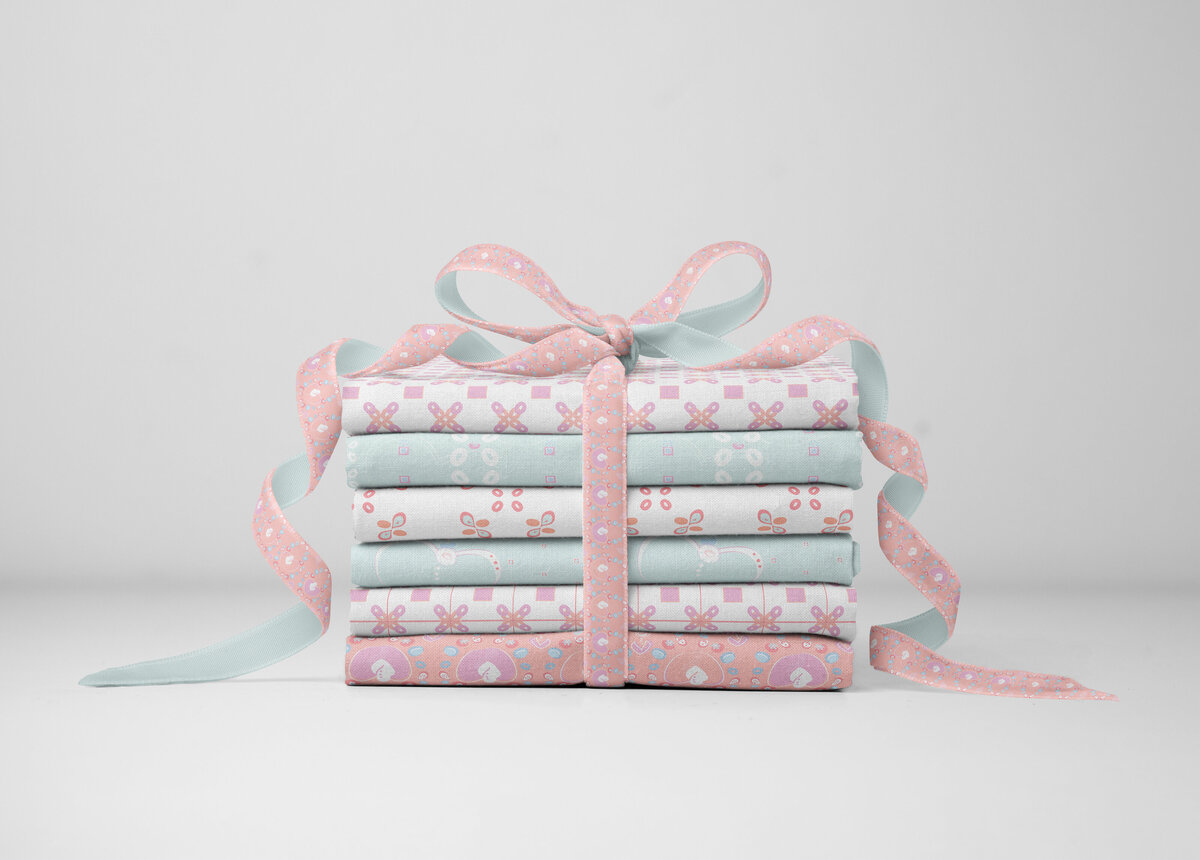 Stack of patterned fabrics tied with a bow