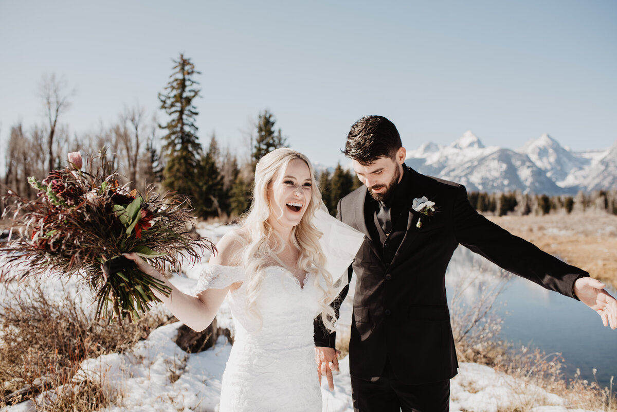 Jackson Hole Photographers capture couple laughing after Grand Teton elopemen t