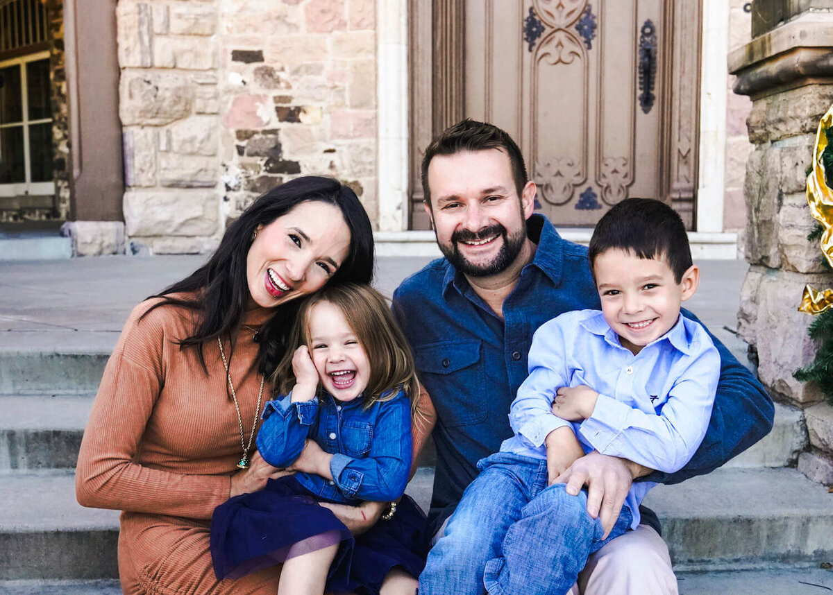 denver family photography - couple and kids sitting on steps