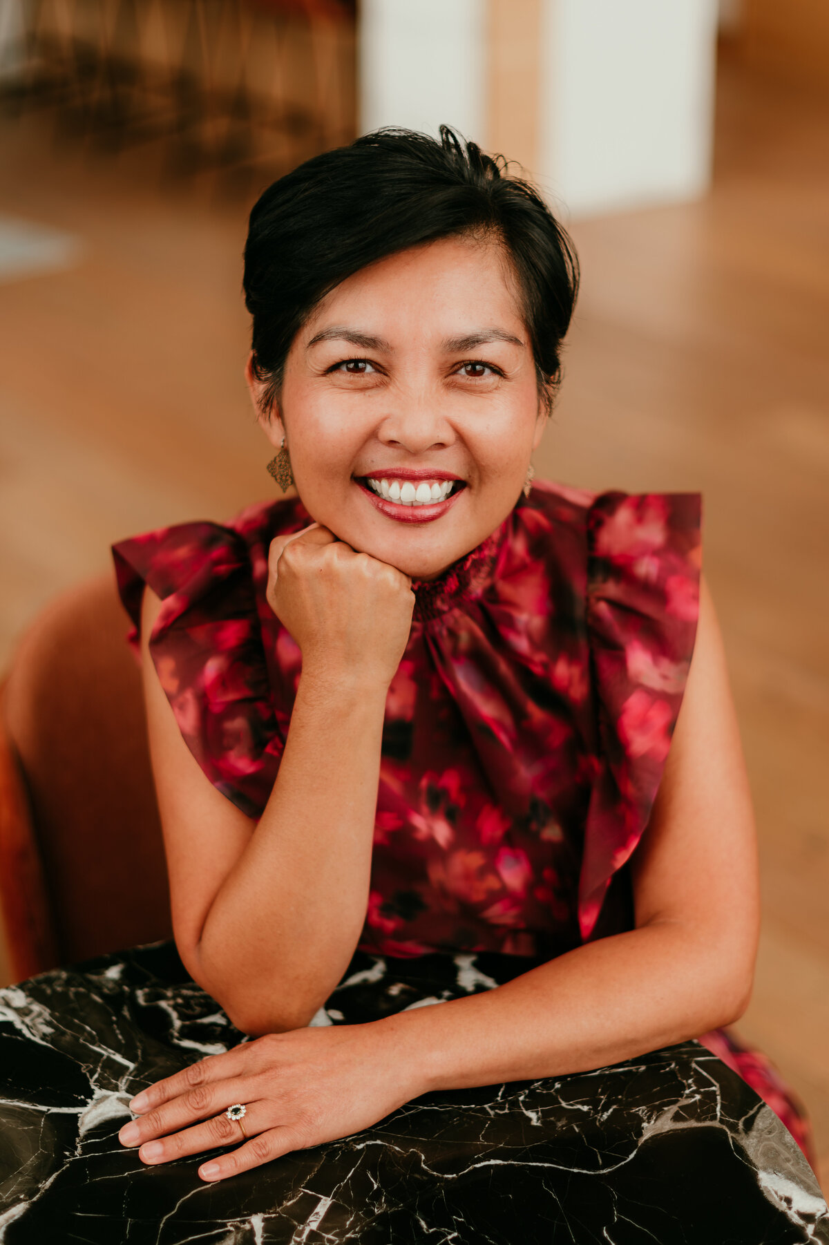 Clean and modern LinkedIn headshot taken in Minneapolis with soft natural light and confident posture.