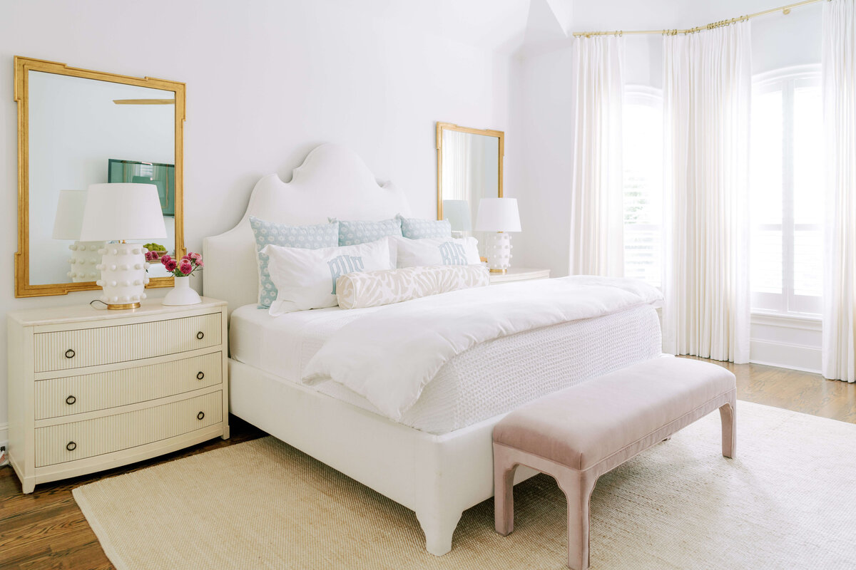 oyster creek studios hause white bed and bureau in bedroom