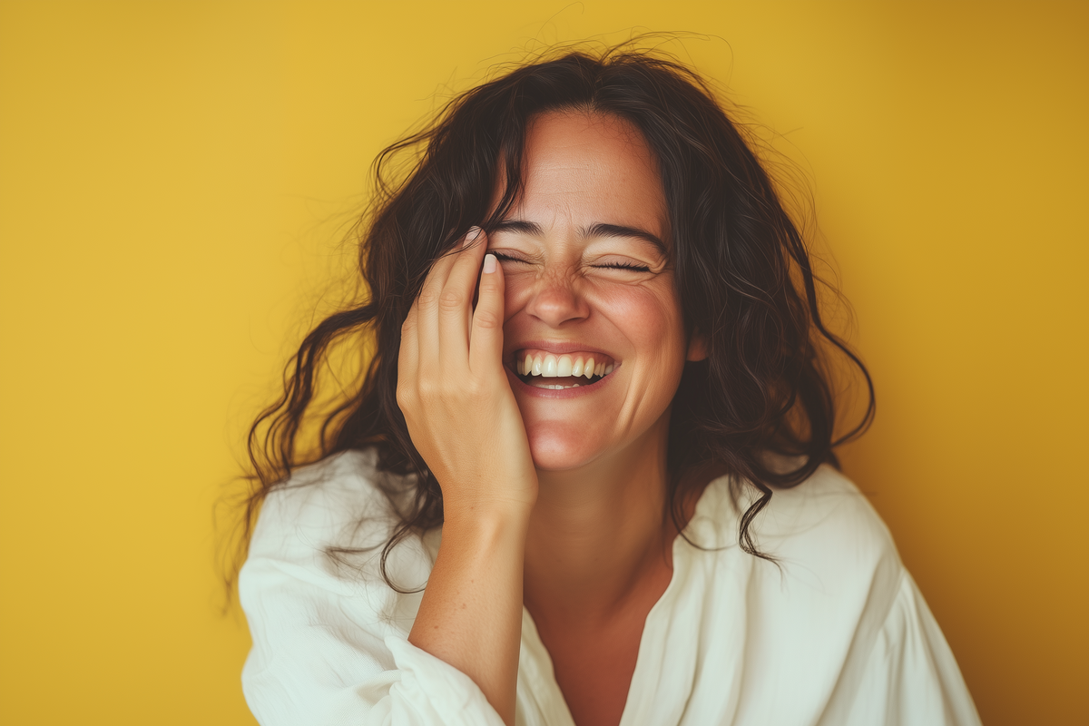 lauriehill_06679_A_candid_close-up_of_a_40_year_old_woman_laugh_c96c44e0-d888-4661-9e4d-e86c51debedd