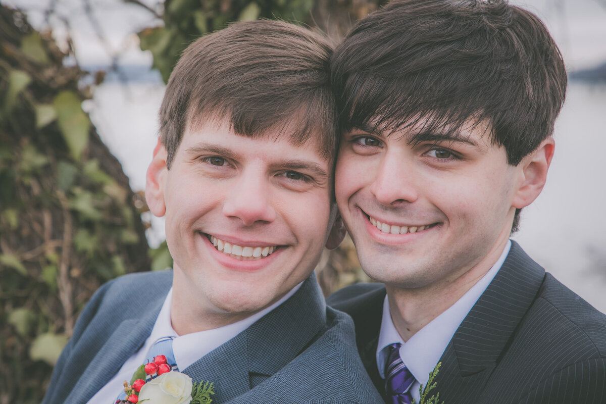 Closeup of grooms holding hands during their elopement in NY.