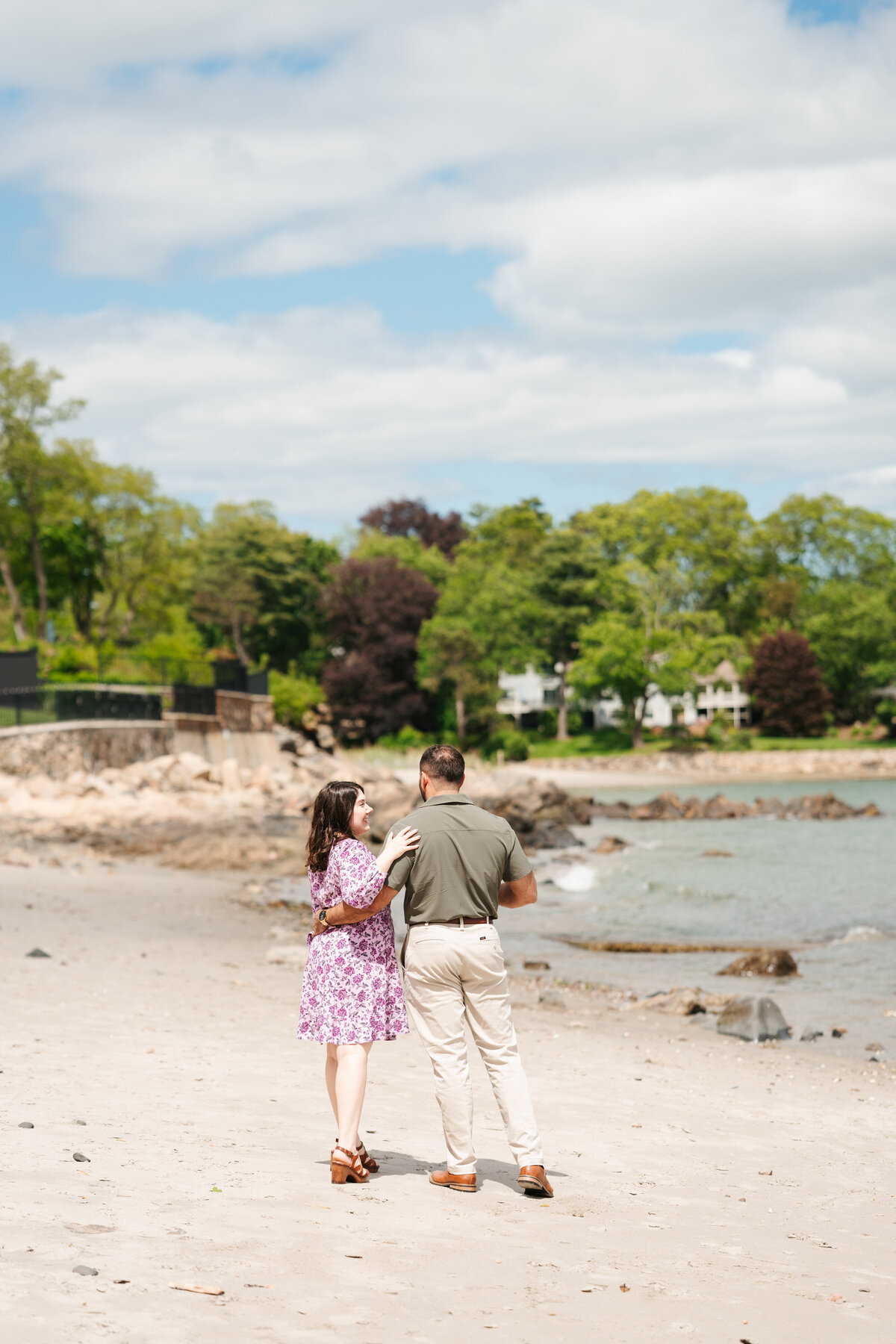 Candid moment between engaged couple at Lynch Park by Danielle Littles Photography