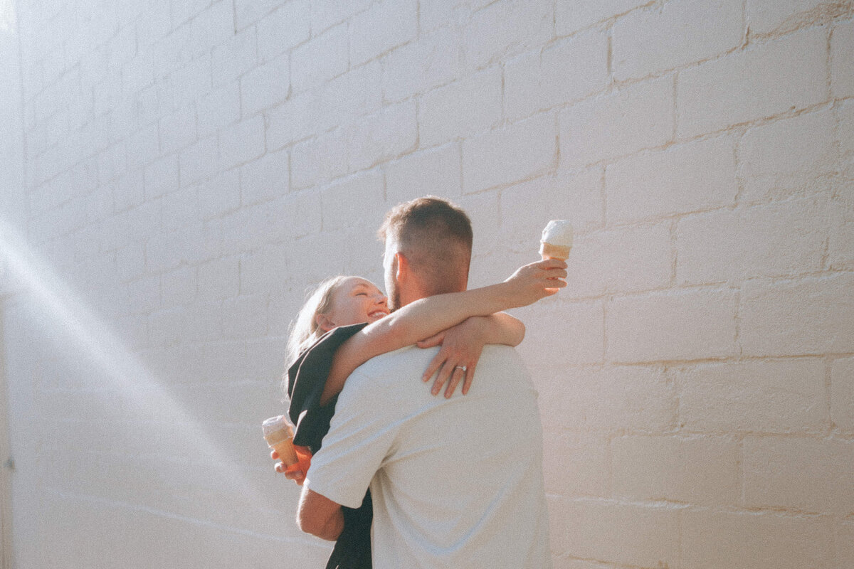 Couple during golden hour engagement shoot in Boise, Idaho wedding/elopement - photographed by The Storytellers