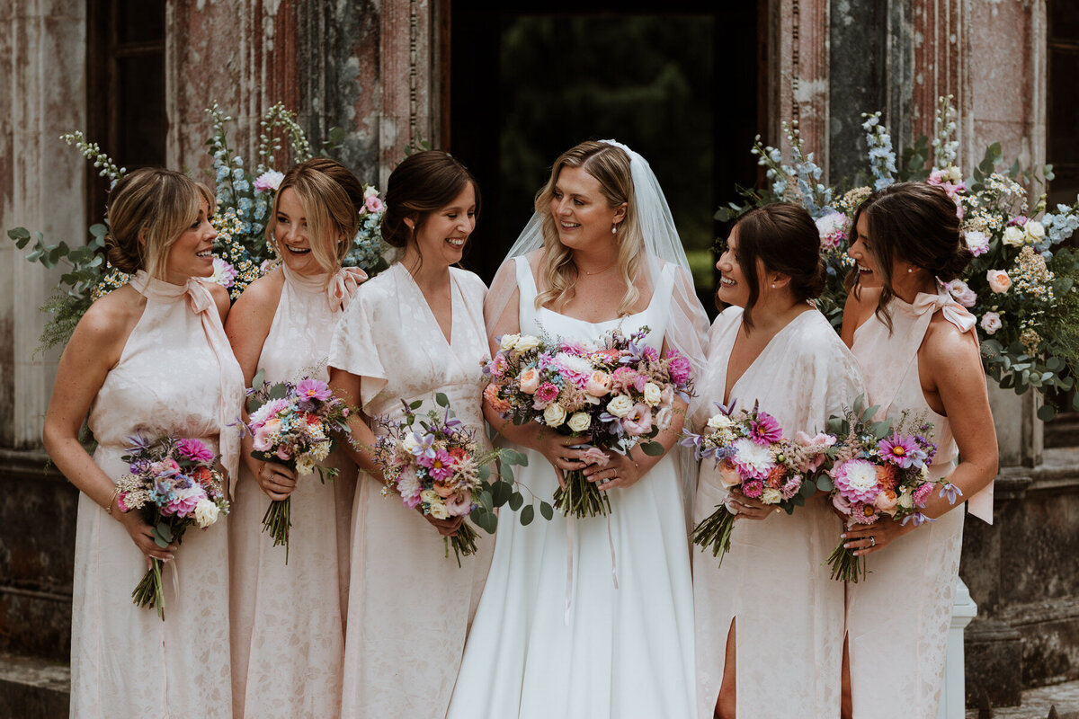 Bride with bridal party and bouquets