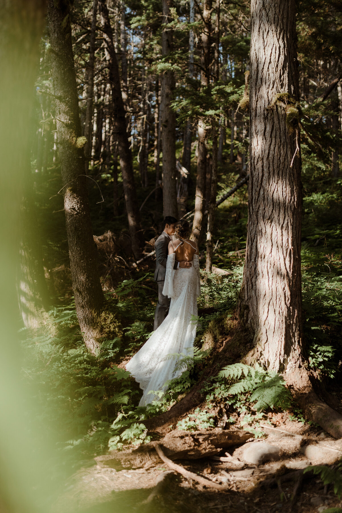 bride posing in forest