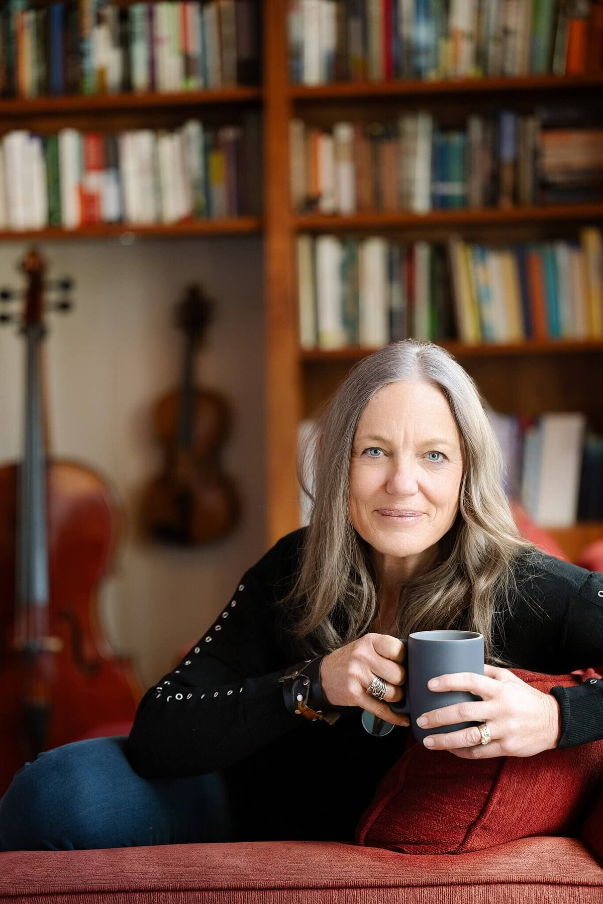headshot woman book author in her living room