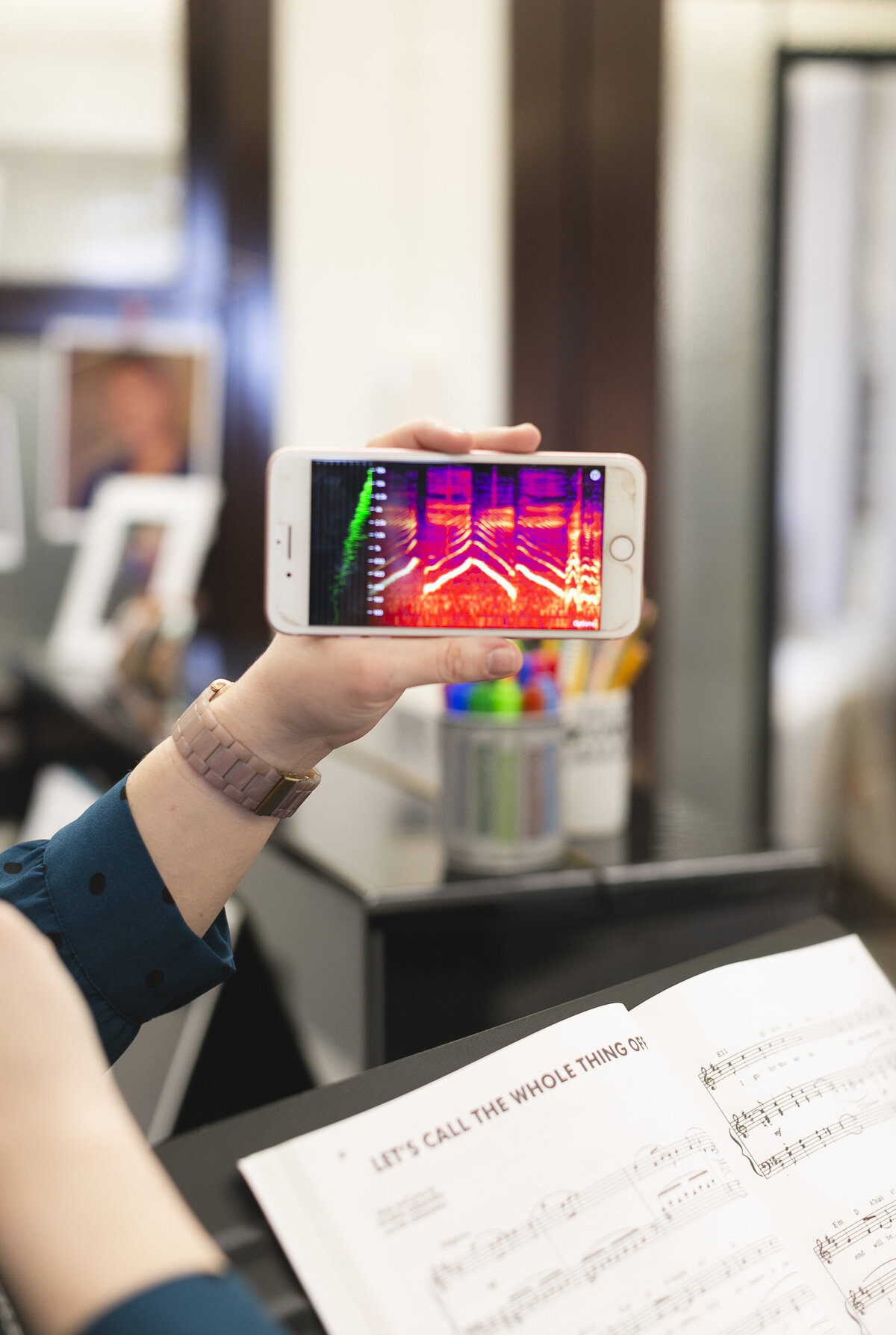 A spectrogram on a phone during a voice lesson