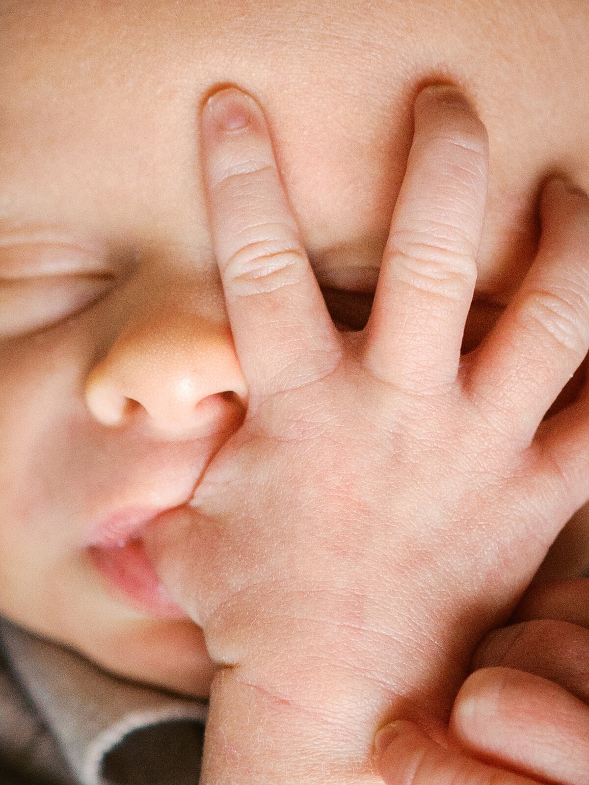 newborn-baby-sucking-on-thumb