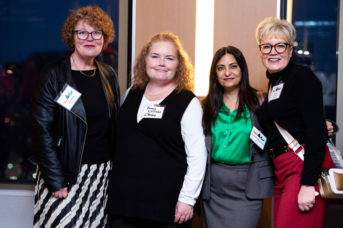 a photo of four female organizers smiling.  Captured by Ottawa Event Photographer JEMMAN Photography COMMERCIAL