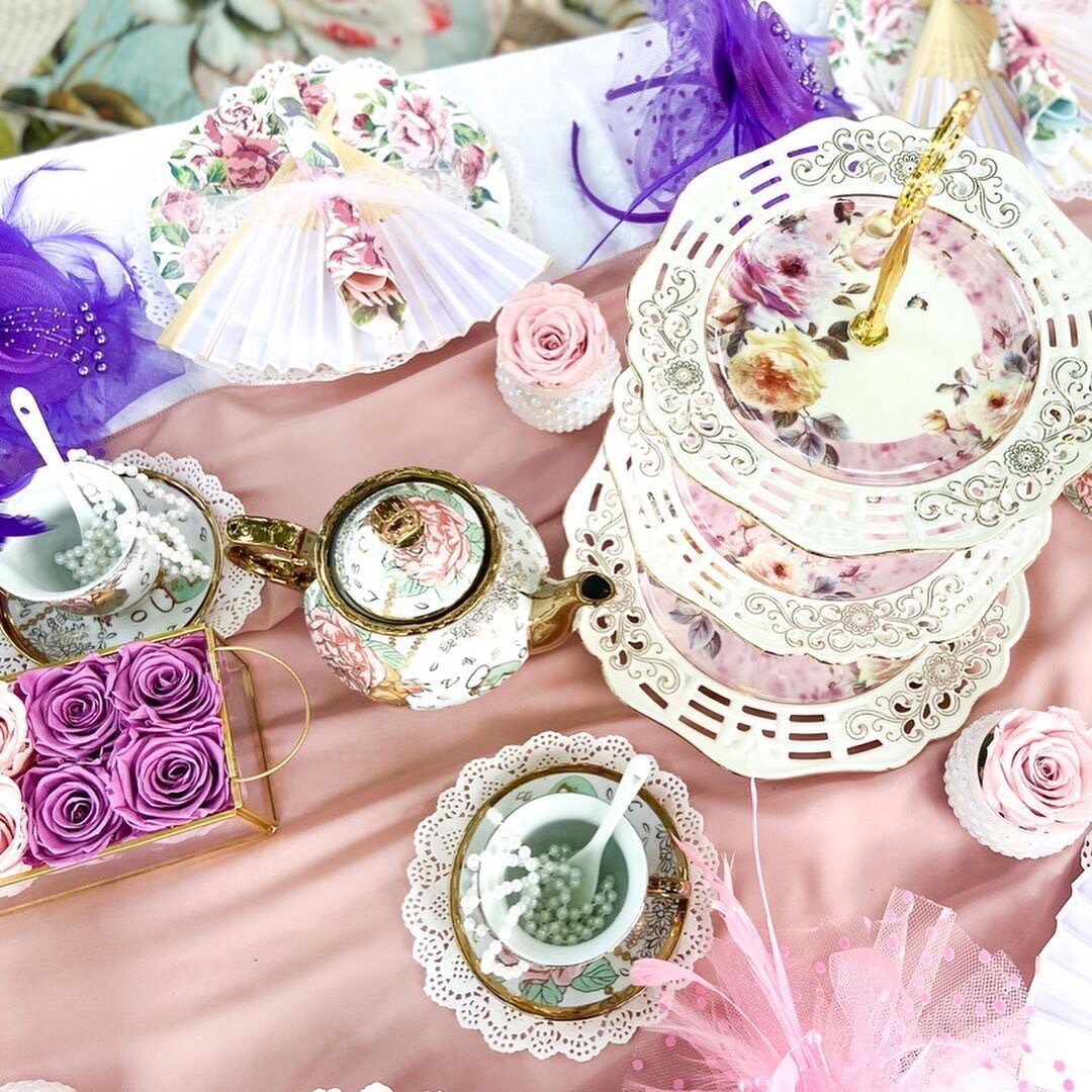 tea party picnic vintage glasses and teapot and tiered dessert stand