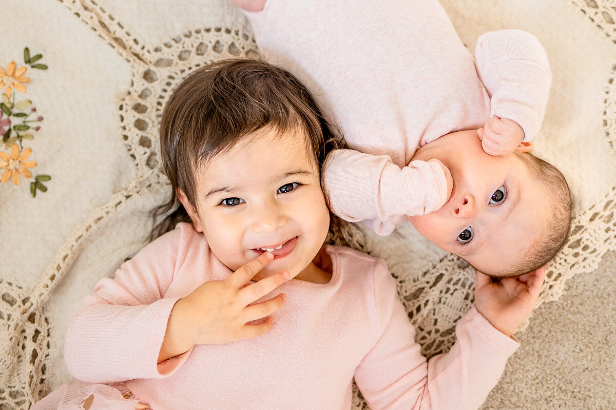 Baby girls and toddler laying on blanket, Westfield NJ newborn session