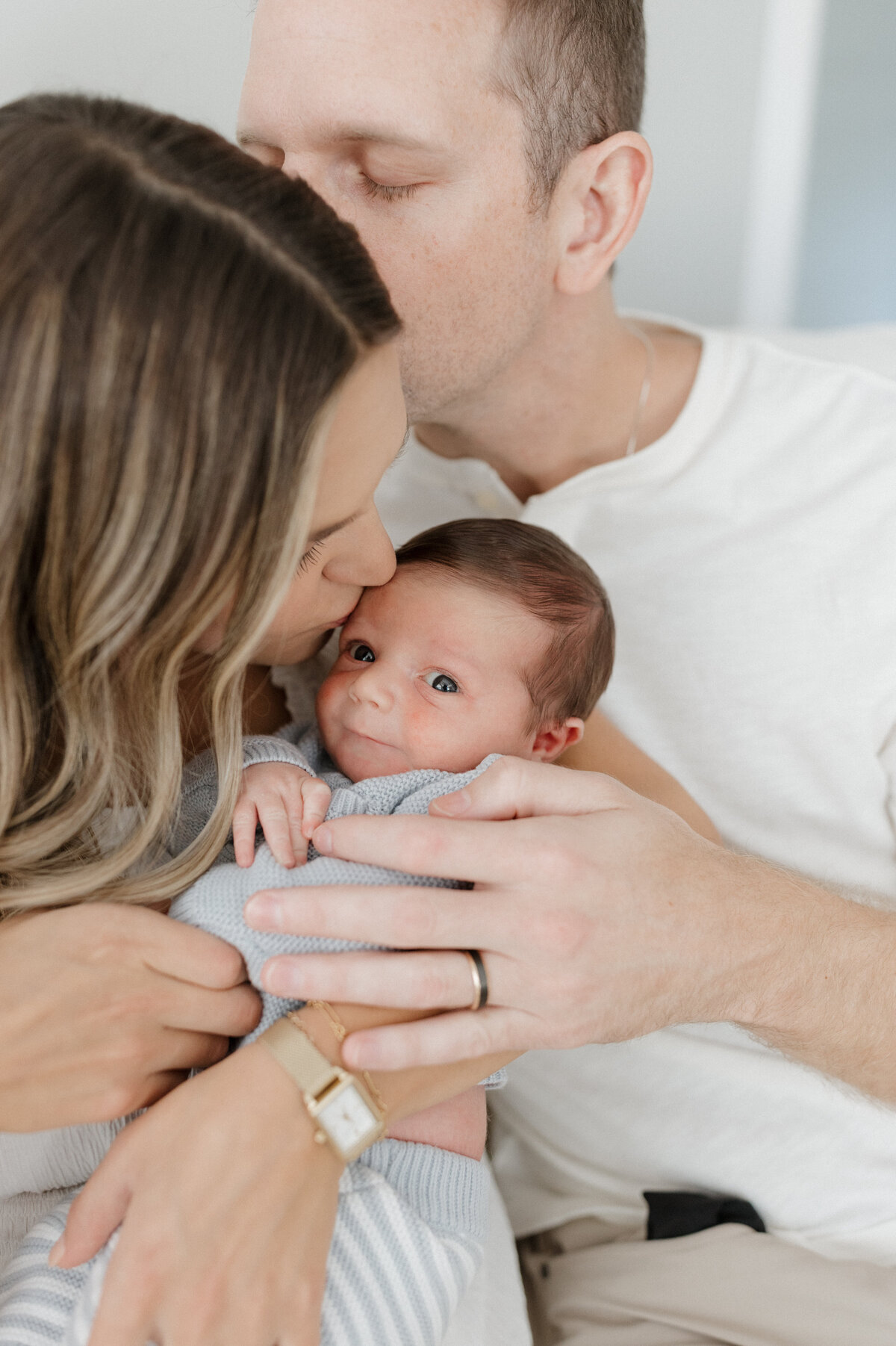 Indianapolis lifestyle family photography parents with newborn