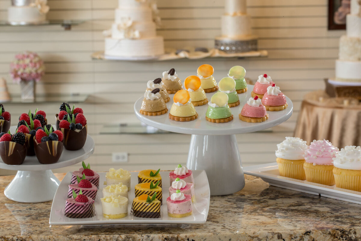 Display of colorful mini desserts and cakes