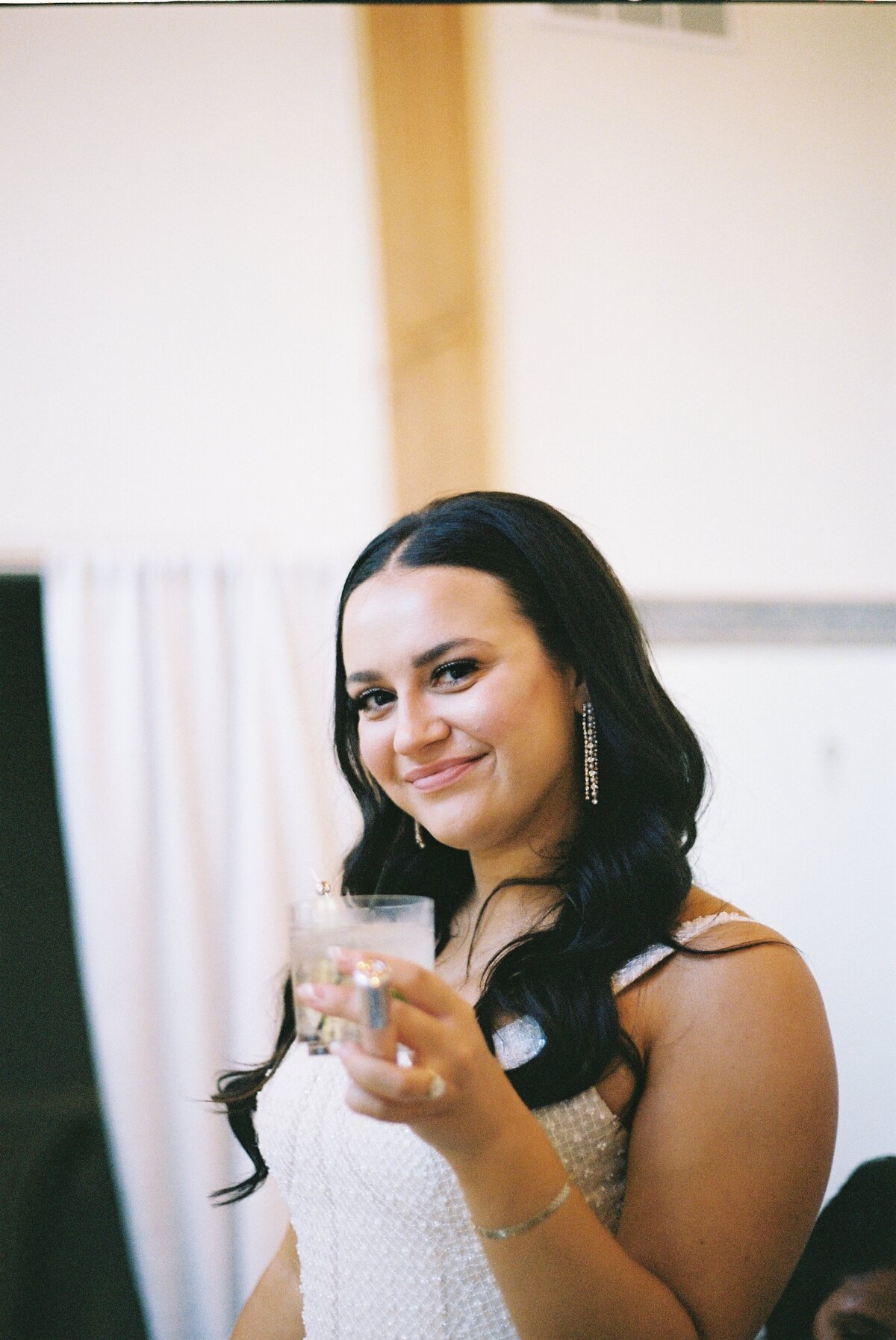 happy bride enjoying beverage