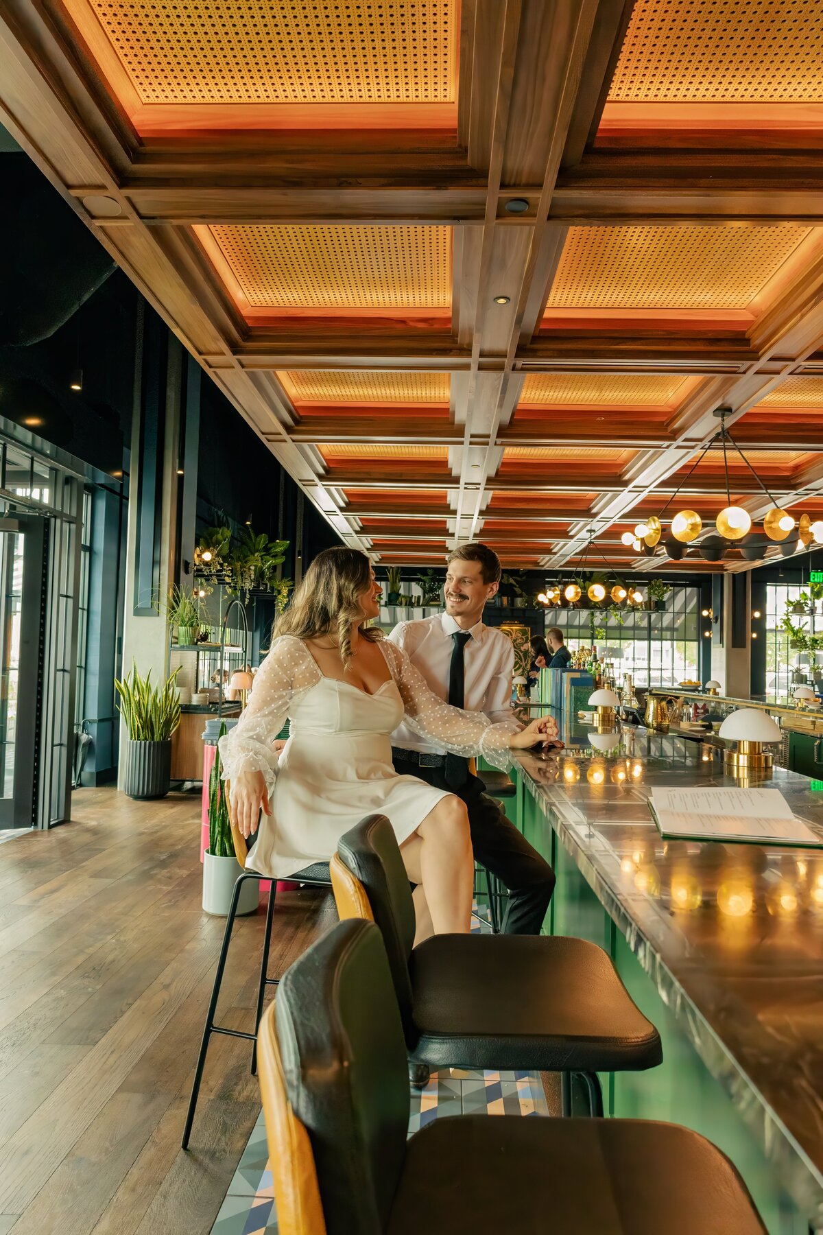 Claire Katan Creative downtown restaurant engagment potos at Memoir in Omaha.