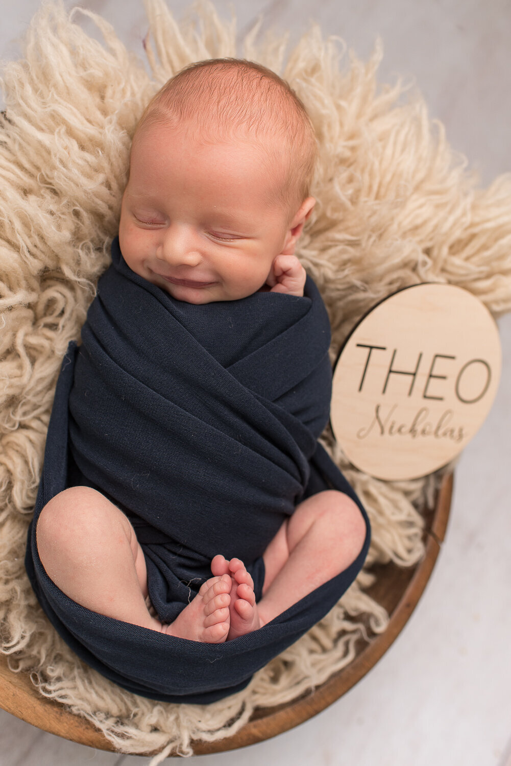 Newborn boy smiling at rustic neutral newborn session |Sharon Leger Photography | Canton, CT Newborn & Family Photographer