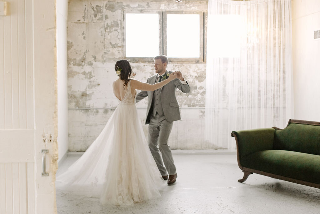 Bride and groom dancing in the bridal suite