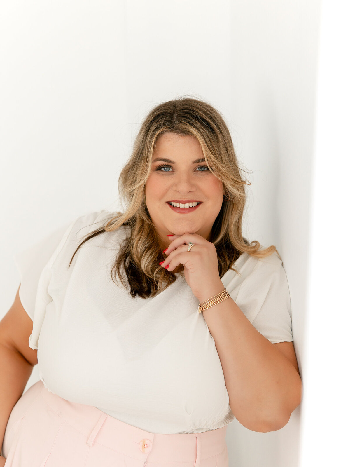 Woman posing for headshots