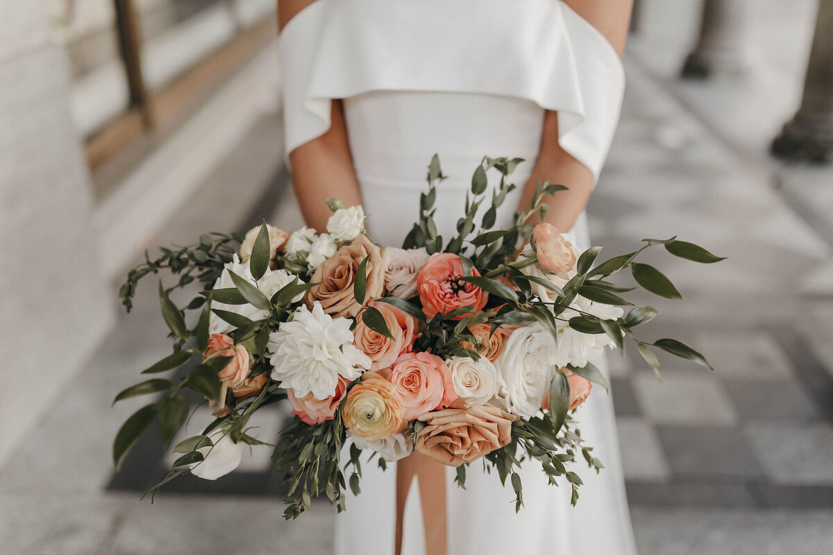 Classic and elegant bouquet of pink, peach and white roses by Flower Aura By Natasha, classic Calgary, Alberta wedding florist, featured on the Brontë Bride Vendor Guide.