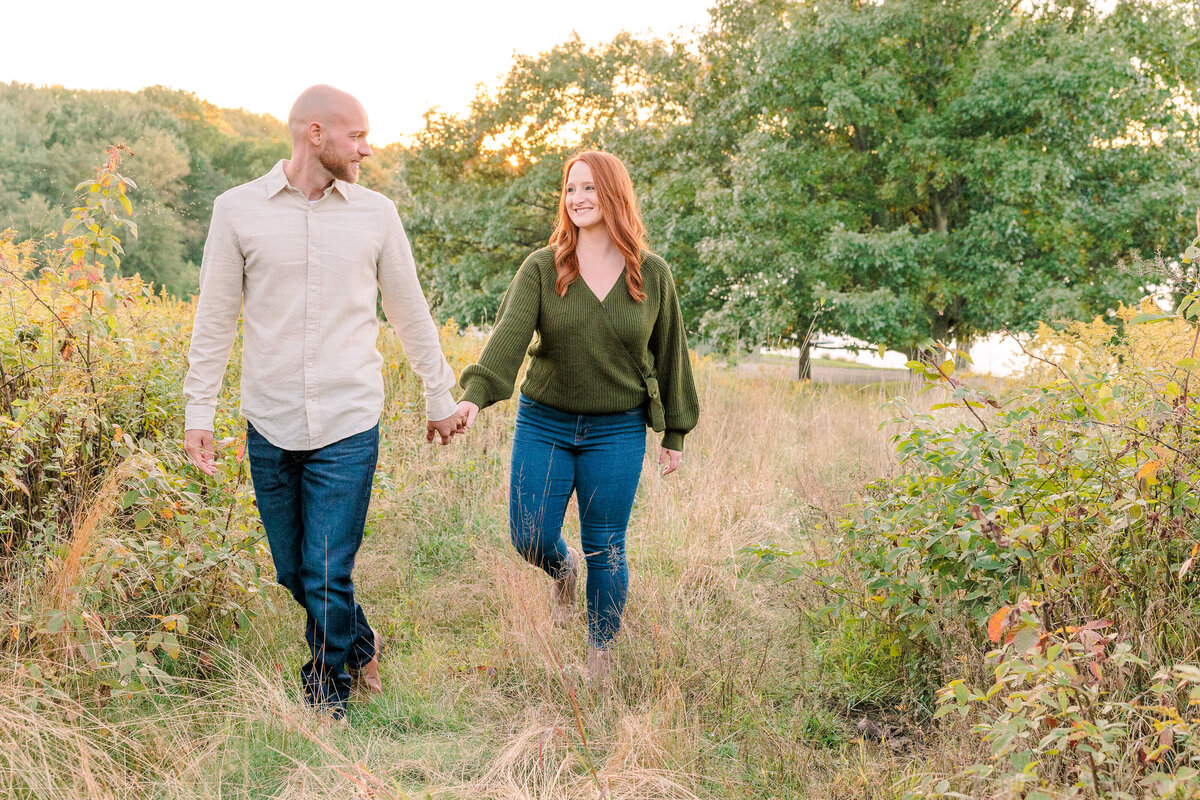 Golden hour engagement session meadow tall grass