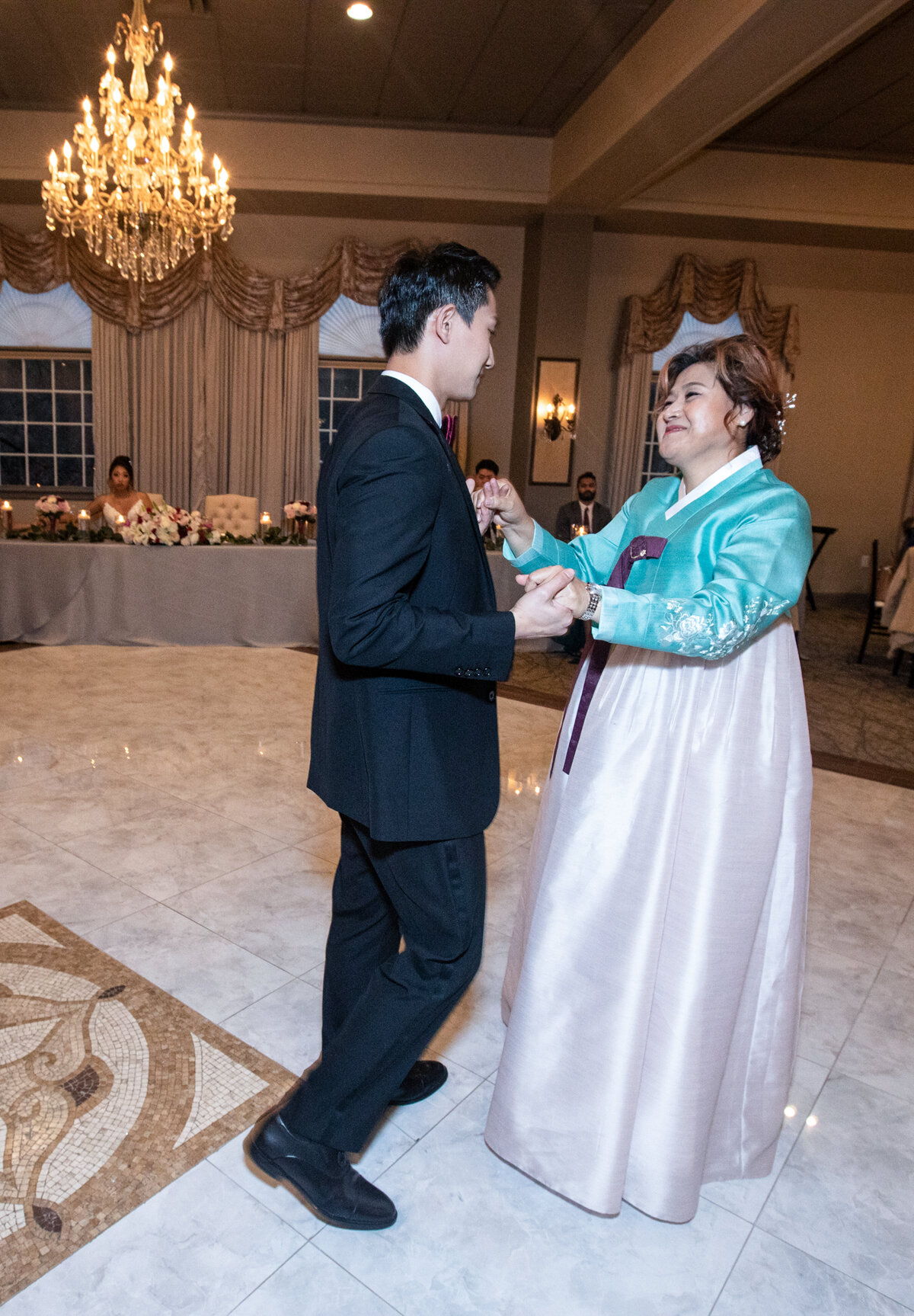 groom-dancing-with-mother-tate-house-wedding-tradition