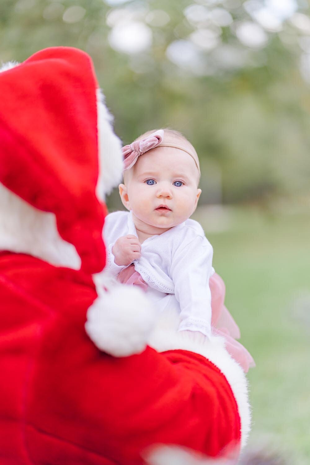 baby girl during Haymarket, VA santa mini session