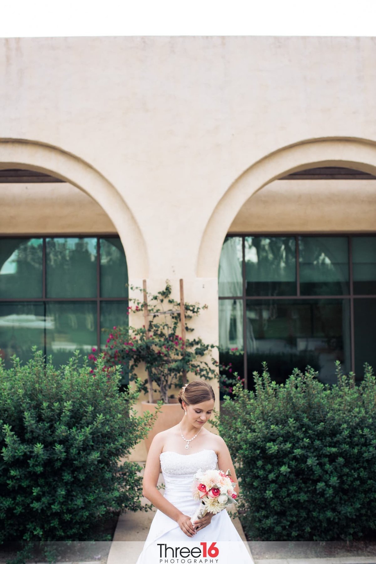 Beautiful Bride posing in front of the Bell Tower Community Center in Rancho Santa Margarita