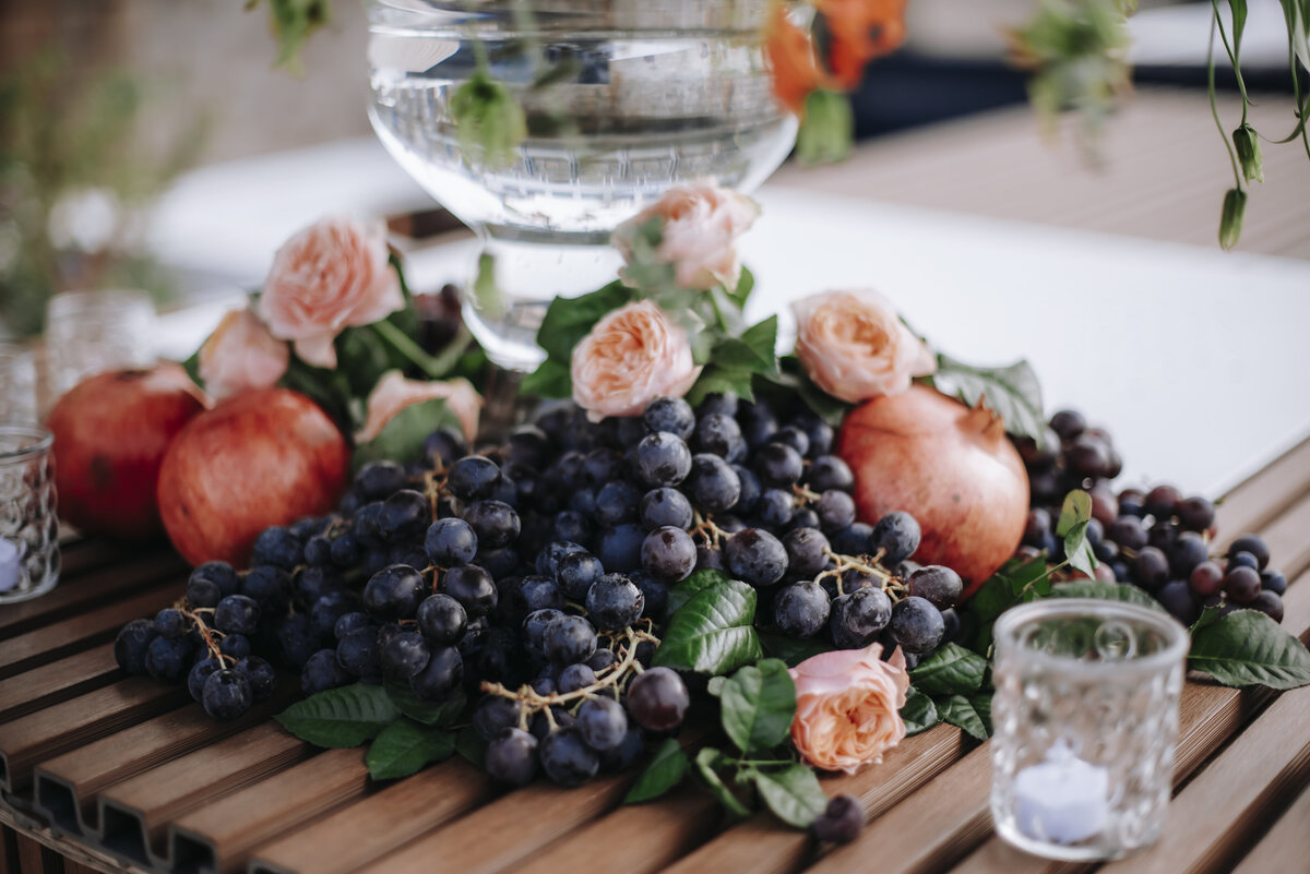 horizontal grapes and pomegranates