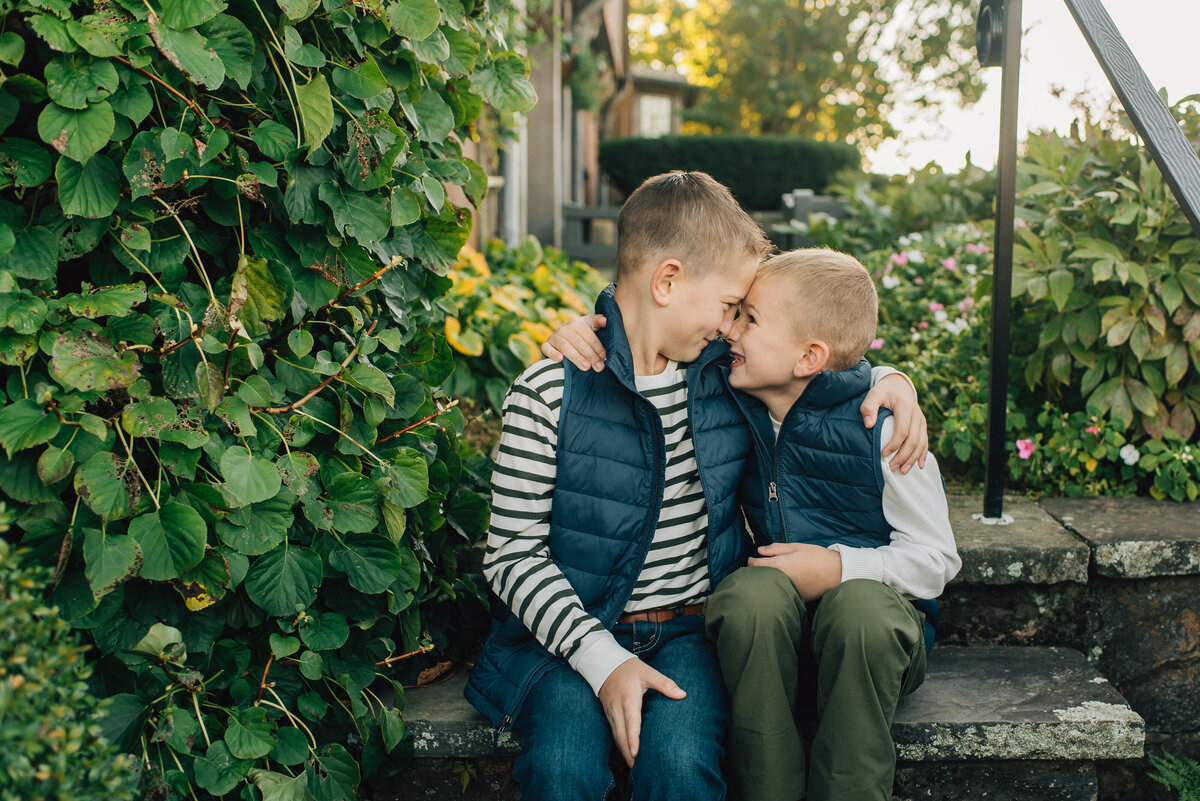 Brothers with arms around each other at their extended family session in CT