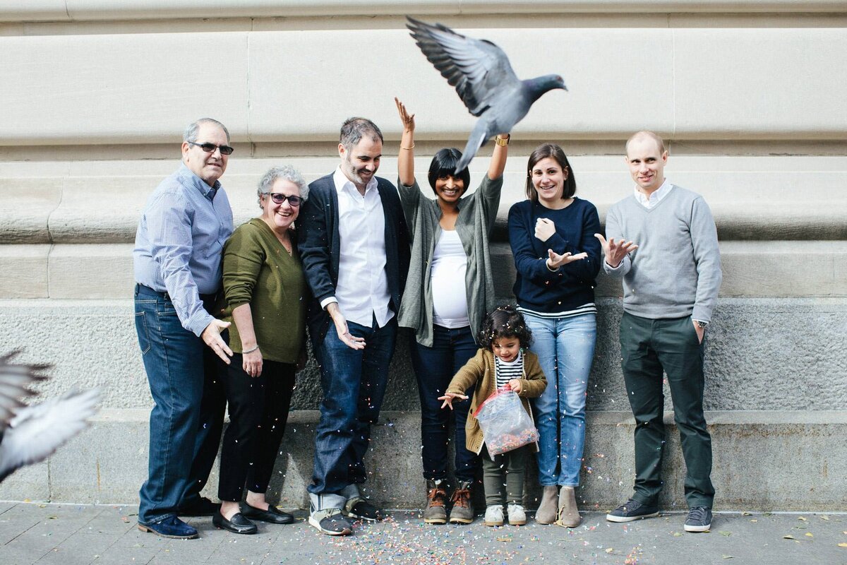 nyc upper east side family session at met museum with pigeon flying and confetti
