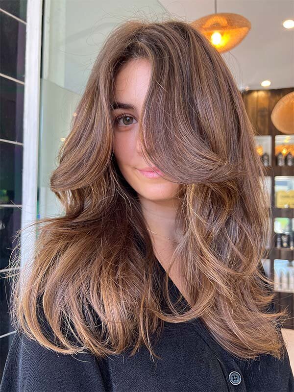 Soft brown waves with dimensional highlights, emphasizing premium hair colouring services and colour correction expertise at Blake & Kwan Kirrawee.