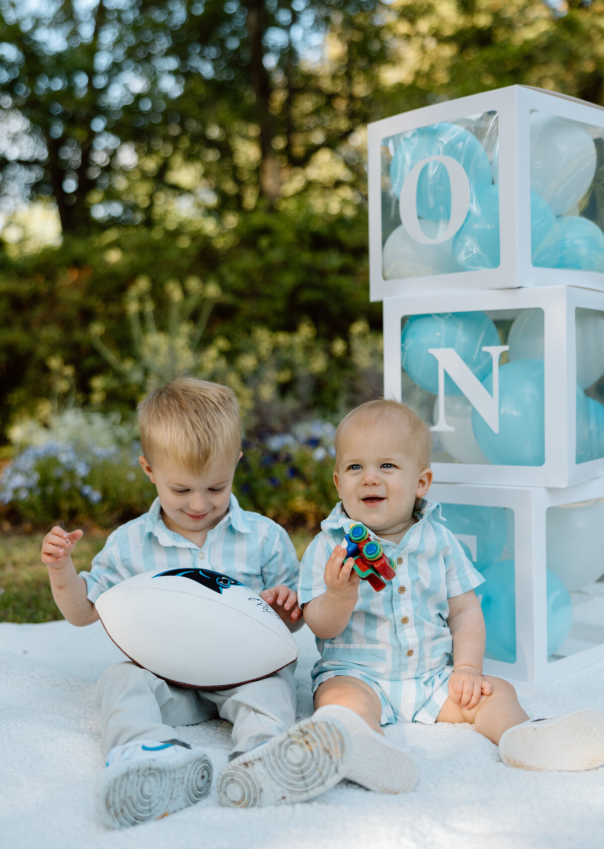 Sibling photos to celebrate first birthday