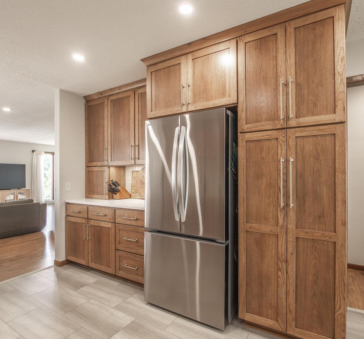 fridge and custom cabinetry in kitchen