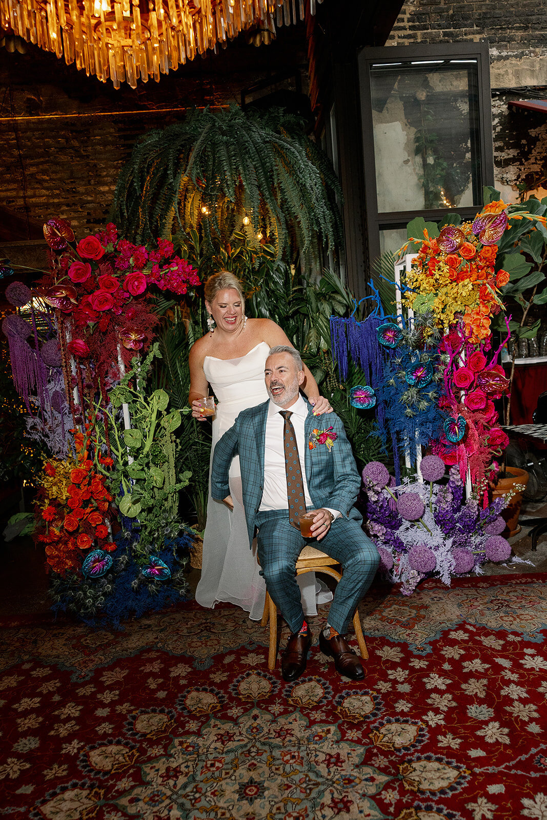 luxury floral backdrop bride and groom