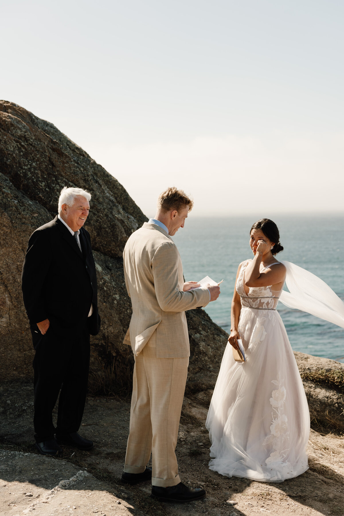 bride and groom exchange vows in carmel