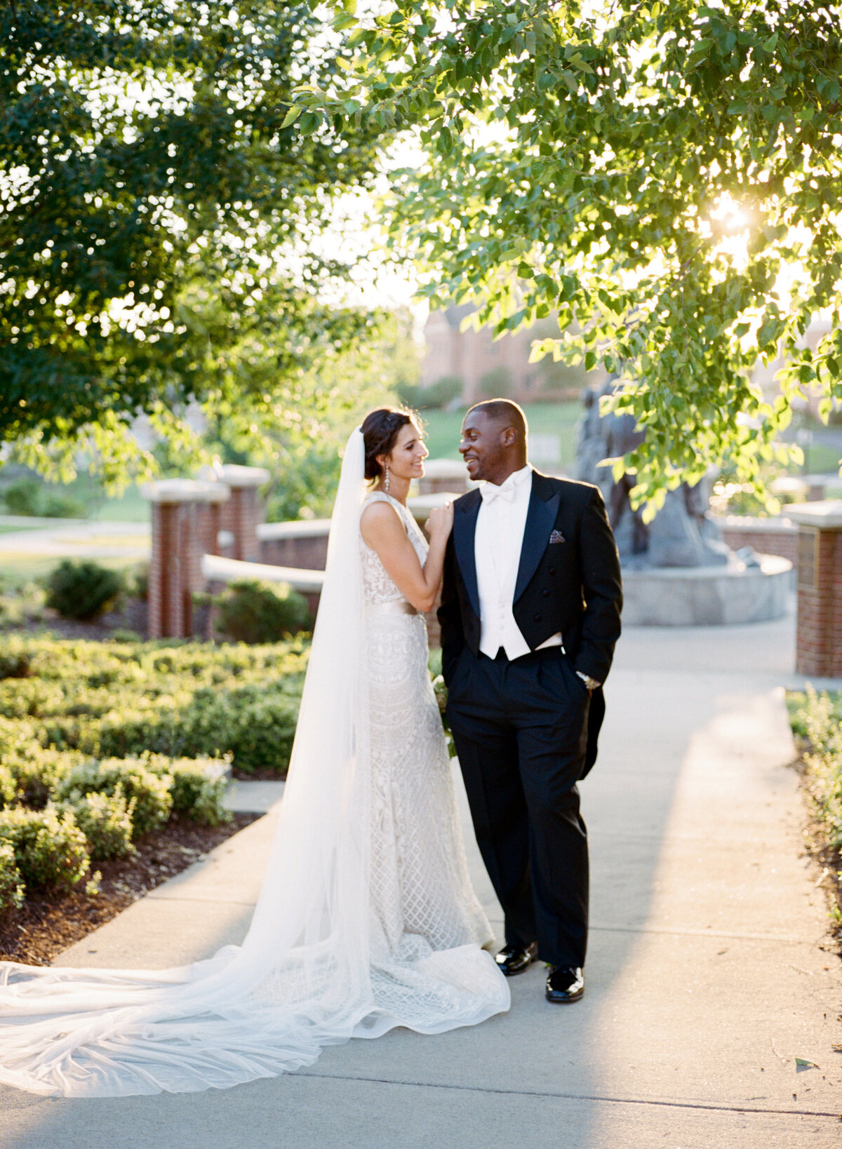 image of bride and groom admiring each other outdoors