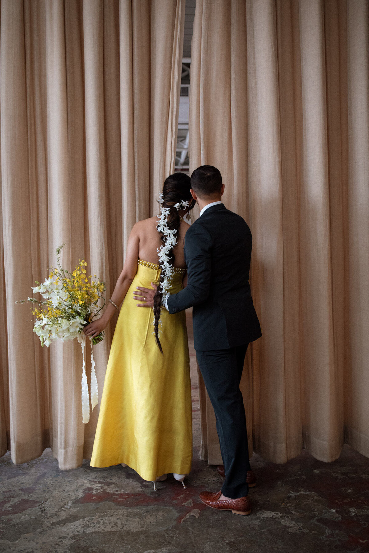 rule of thirds brooklyn wedding with yellow vintage cha cha linda dress and white floral braid