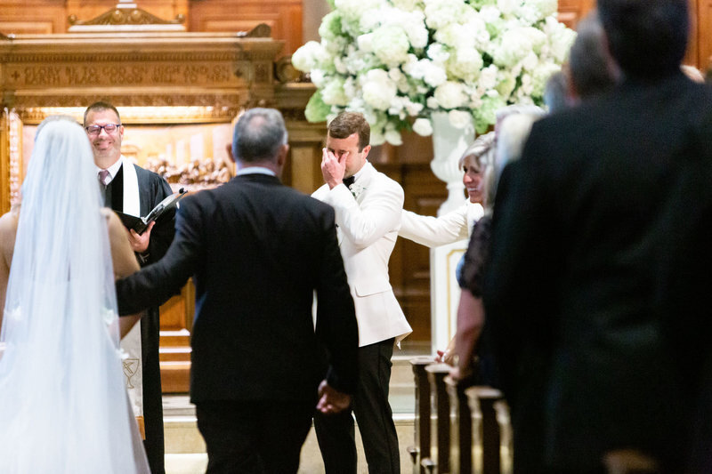groom-crying-bride-walks-down-aisle-national-city-chrisitian-church