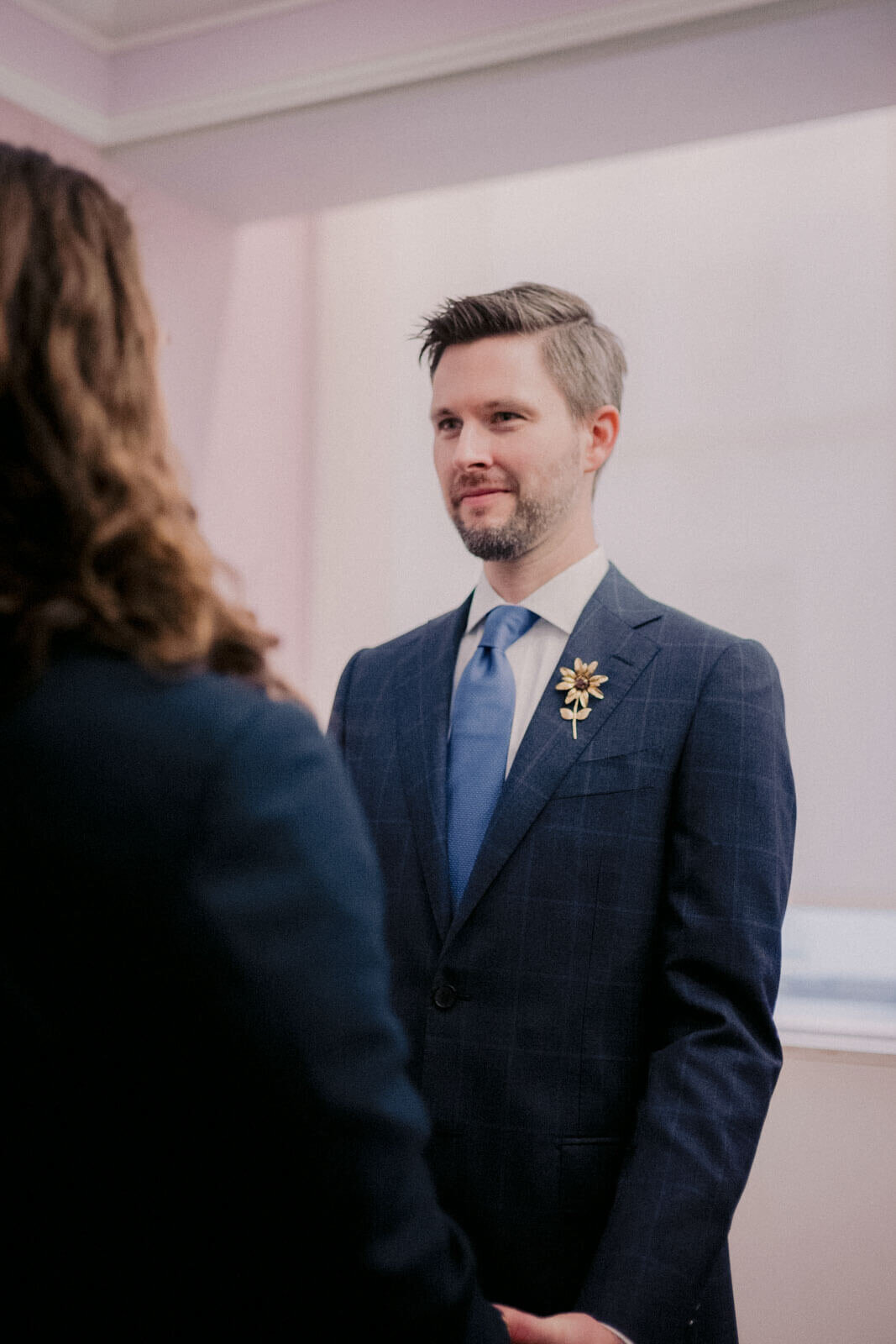 The groom is staring at his groom. NYC City Hall Elopement Image by Jenny Fu Studio