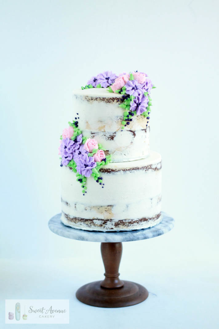 rustic semi naked buttercream wedding cake with piped buttercream flowers, wedding cakes Niagara