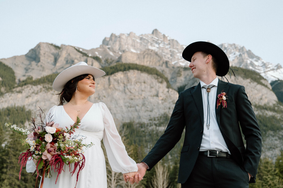 Banff elopement in Banff national park with cascade mountain in the background.